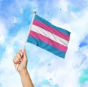 Hand Holding A Trans Flag 