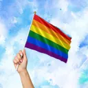 Hand_Holding_A_LGBT_Flag