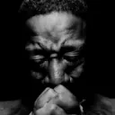 Black man praying