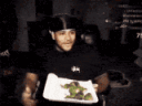 FANUM THROWING HIS FOOD